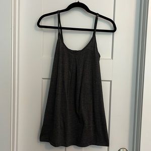 Tobi loose fitting tank top with elastic at top back.  Very comfy.  Grey color.